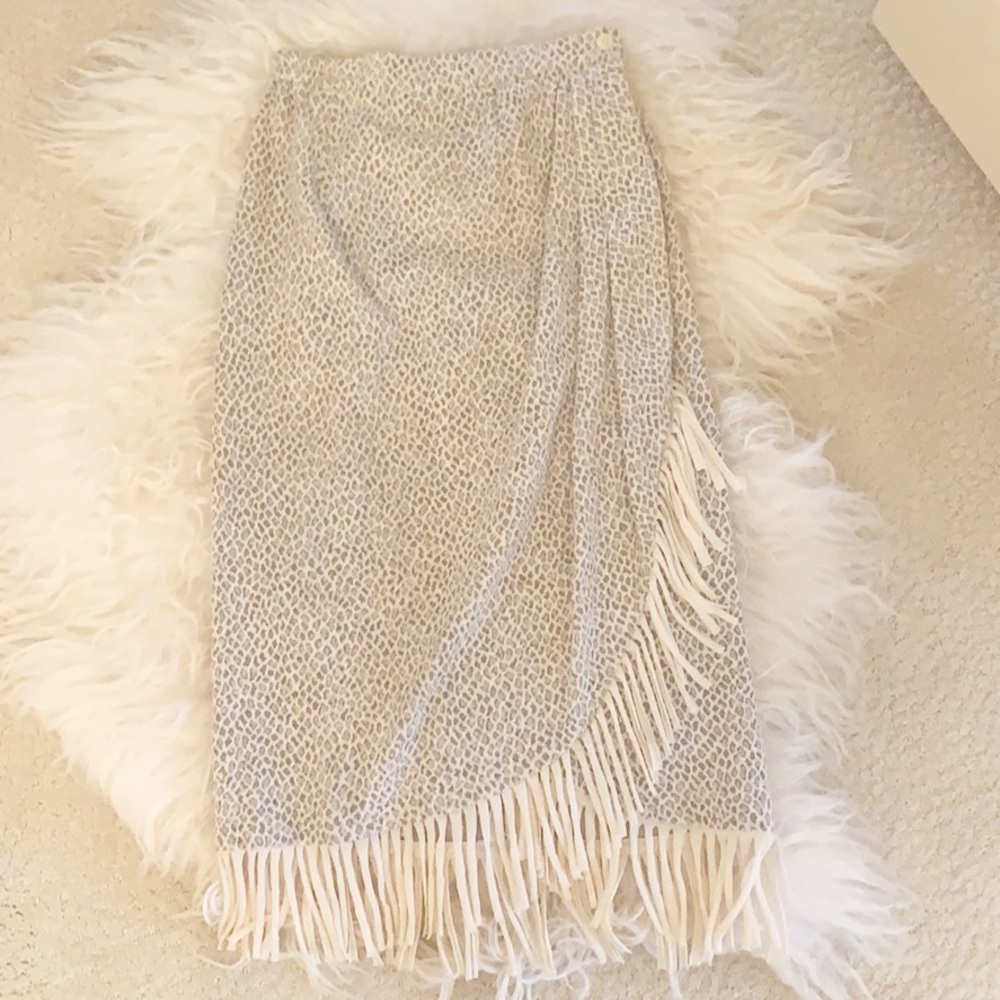 Wrap around skirt. Cream fringe. Animal print